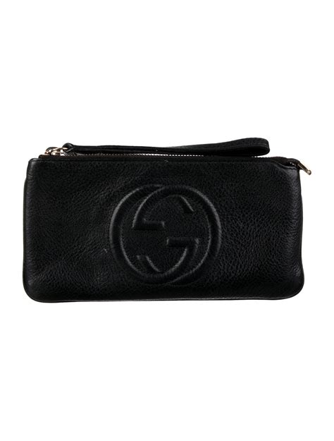 gold gucci soho wristlet|Gucci clutches for women.